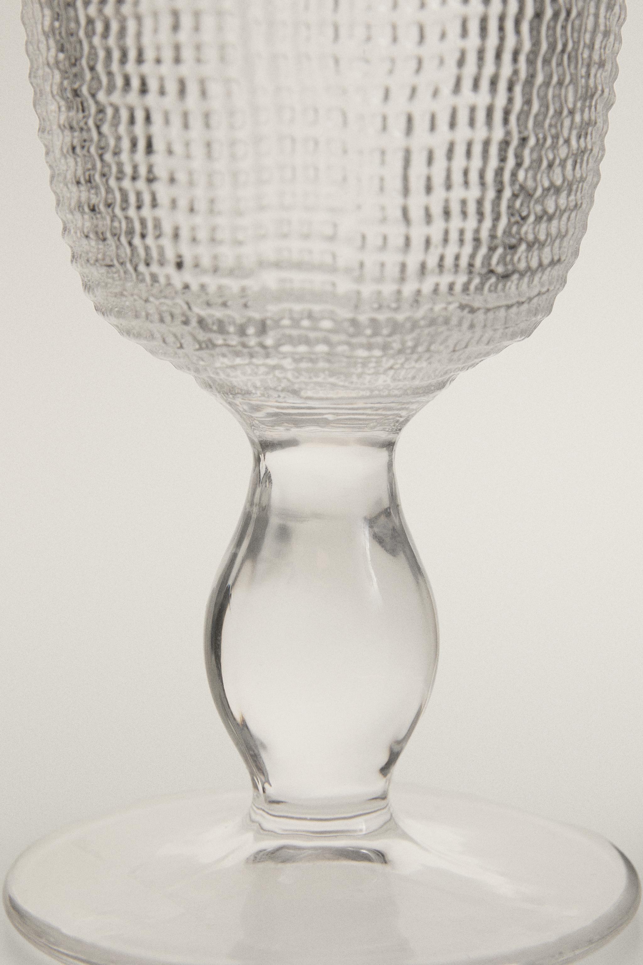 RAISED DESIGN GLASS